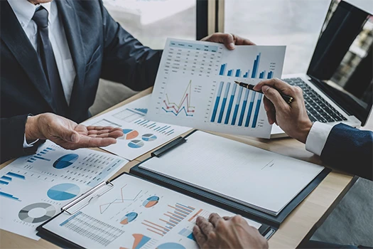 Finance manager meeting discussing company growth KSJCK9J